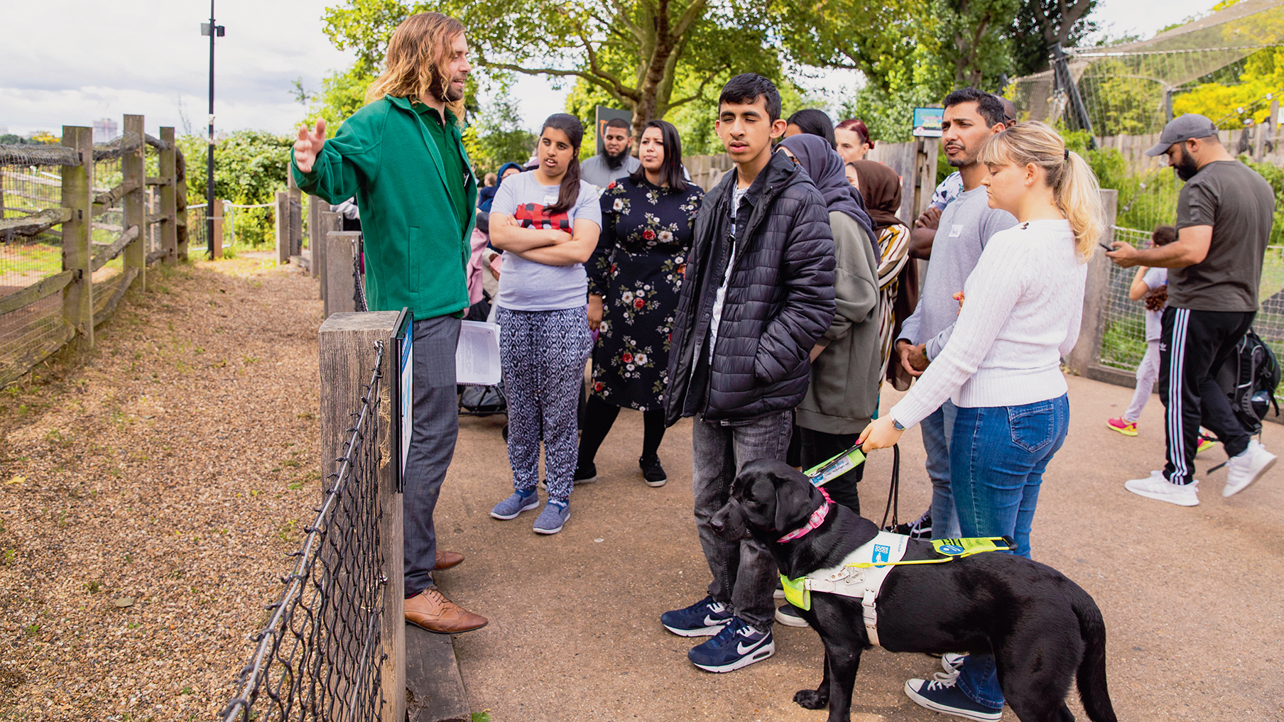 a-group-of-blind-visitors-receiving-an-audi-described-tour-at-london-zoo.jpg