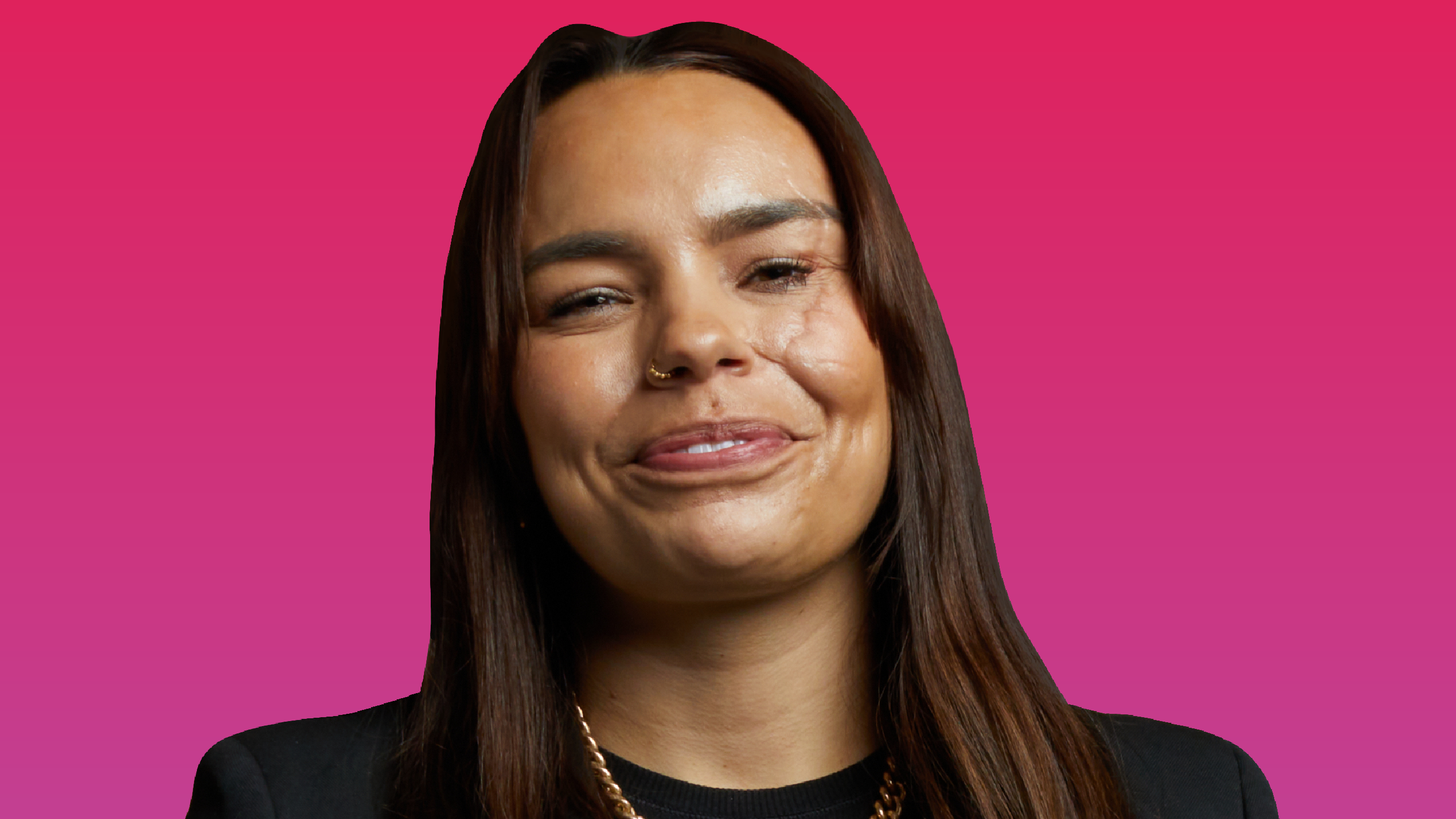 Photo of Phyllida Swift smiling in front of a pink background